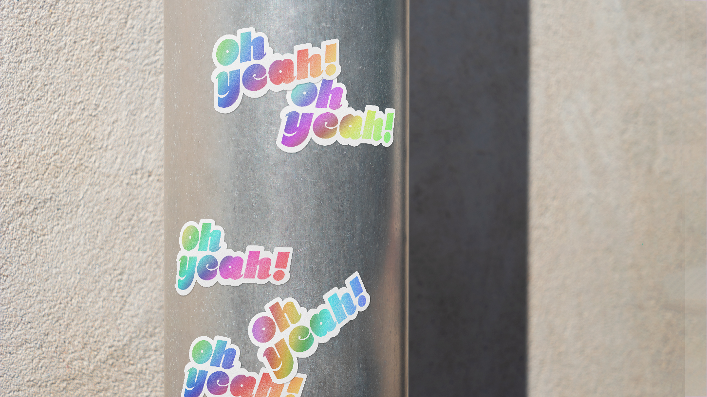 Stickers of the hand lettering logo "oh yeah" in the streets. By Meg Chikhani